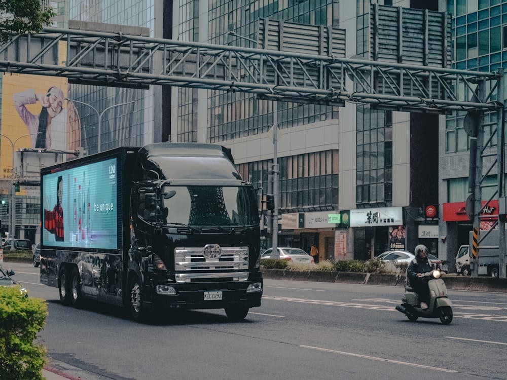 Commercial truck on a highway, representative of fleet SCR diesel applications.